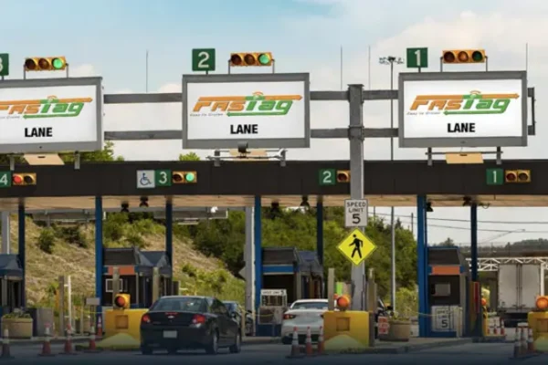 Driver using FASTag Annual Pass 2025 at toll plaza